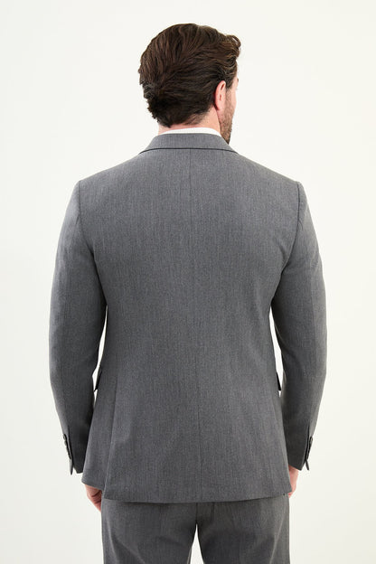 Men’s heather gray slim-fit double-breasted wool-blend suit with wide peak lapels, point-stitch lapel edges, barchetta chest pocket, mottled buttons, and origami lapel pin.