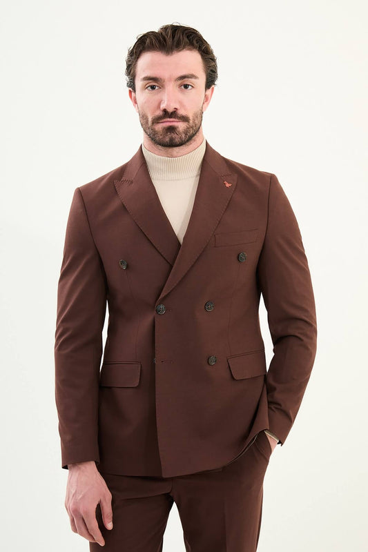 Men’s deep chocolate brown slim-fit double-breasted 6x2 suit with peak lapels, cotton-wool-viscose blend with stretch, designed for breathable comfort and wrinkle-resistant wear, styled with a cream turtleneck.
