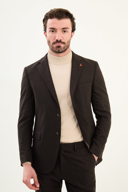 Men’s deep brown slim-fit single-breasted wool-blend suit with notch lapels and matte finish, high-wool fabric with stretch for winter wear, styled with a cream turtleneck for tonal dressing.